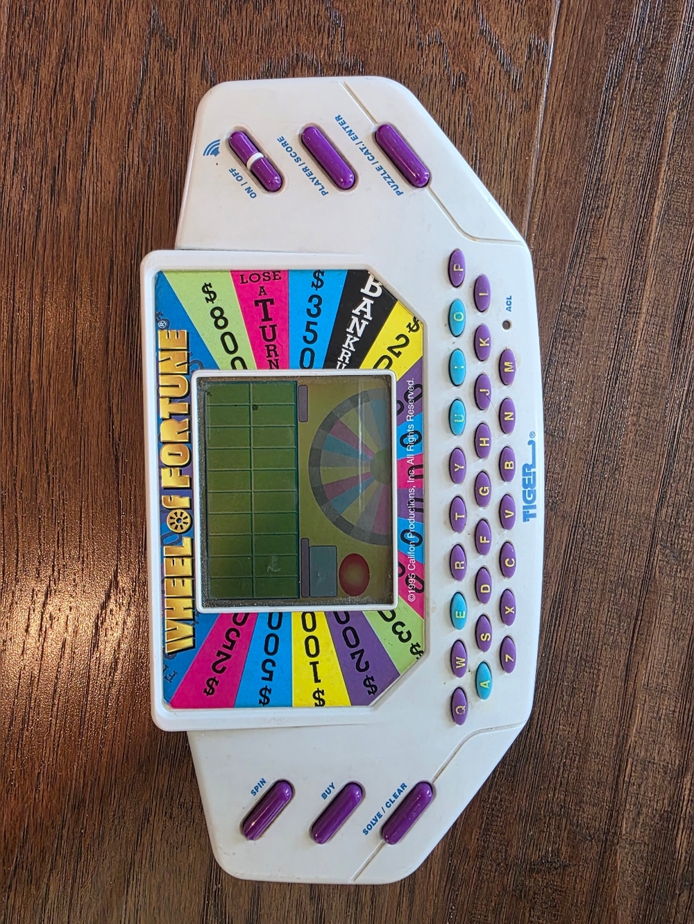 Vintage 1995 Tiger Electronics Wheel of Fortune Handheld Game with Cartridge 7 - Picture 6 of 7